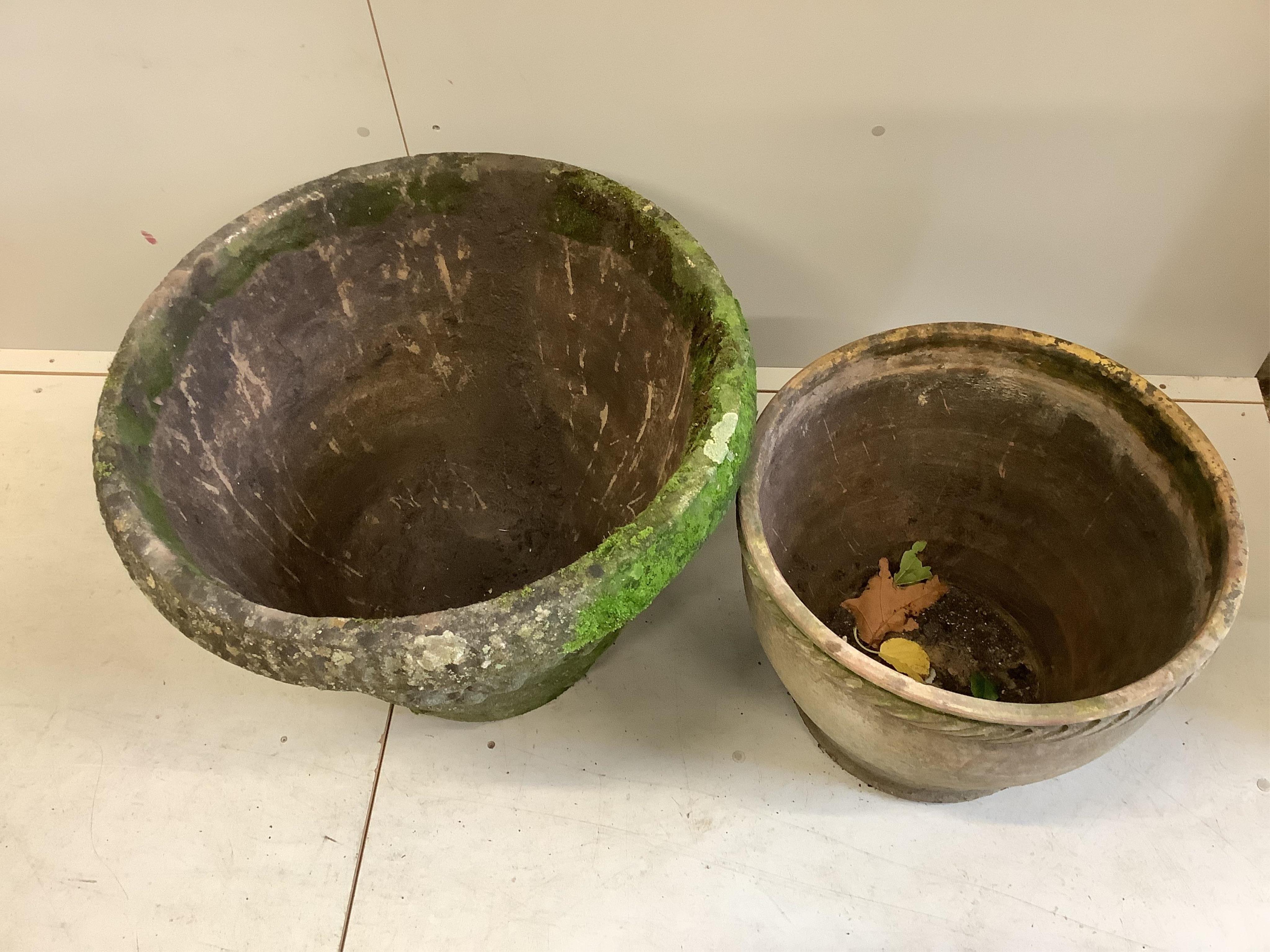 Two circular reconstituted stone and earthenware garden planters, larger diameter 67cm, height 50cm. Condition - fair